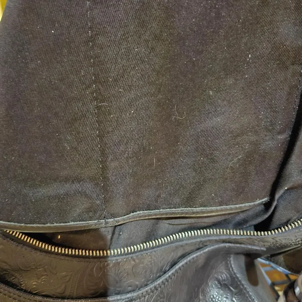 Vilenca Holland black leather tooled slouchy bag